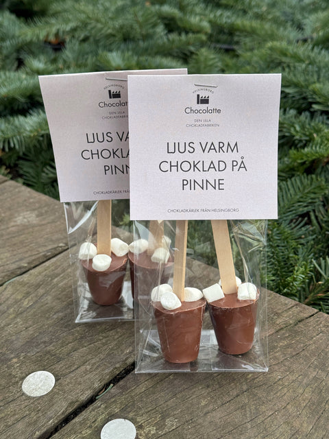 Varm chokolade på pind i mælkechokolade